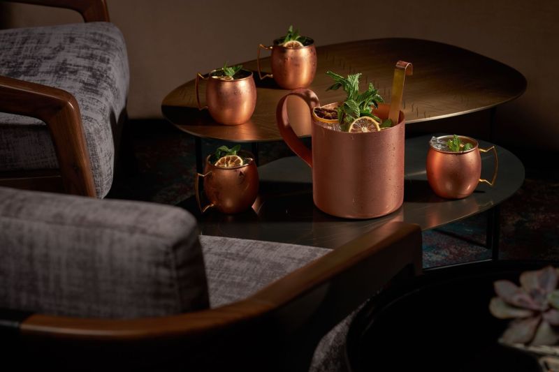 Moscow Mules set on a coffee table